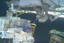 In this image take from NASA video, astronauts Jessica Meir, right, and Christina Koch install batteries for the International Space Station's solar power grid during a space walk Monday, Jan. 20, 2020.