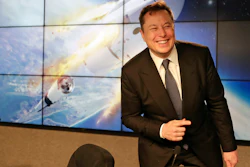 In this Jan. 19, 2020, file photo Elon Musk, founder, CEO, and chief engineer/designer of SpaceX speaks during a news conference at the Kennedy Space Center in Cape Canaveral, Fla. The meteoric rise of Tesla shares that pushed the company's value over $100 billion could turn into a supercharged payday for CEO Elon Musk.