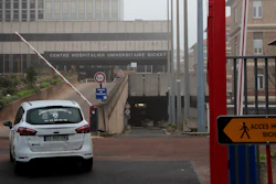 An ambulance drive in to the Bichat hospital in Paris, Saturday Jan. 25, 2020. France has announced three confirmed cases of the deadly new virus from China, the first cases in Europe and the first outside Asia and the United States. One of people who caught the virus is hospitalized in the southwestern city of Bordeaux. The others are in Paris.
