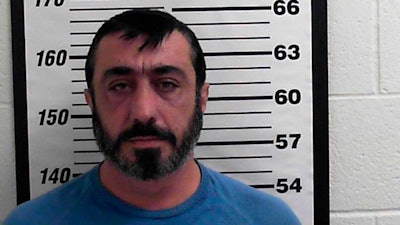 In this photo provided by the Davis County Sheriff's Office shows Lev Aslan Dermen. Openings arguments are set Wednesday, Jan. 29, 2020, in Utah for a California businessman who prosecutors accuse of being a key figure in a $511 million tax credit scheme carried out by two executives of a Salt Lake City biodiesel company linked to a polygamous group. The men from the polygamous group pleaded guilty last year to money fraud and other charges and are expected to testify against Lev Aslan Dermen, who has pleaded not guilty.