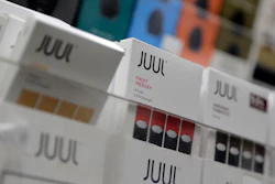 This file photo shows Juul products displayed at a smoke shop in New York.