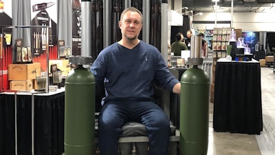 Owner and CEO Doug Ingalls sitting in the Freedom Throne at Shot Show 2020.