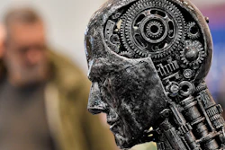 In this Nov. 29, 2019, file photo, a metal head made of motor parts symbolizes artificial intelligence, or AI, at the Essen Motor Show for tuning and motorsports in Essen, Germany. The Trump administration is proposing new rules guiding how the U.S. government regulates the use of artificial intelligence in medicine, transportation and other industries. The White House unveiled the proposals Tuesday, Jan. 7, and said they're meant to promote private sector applications of AI that are safe and fair.