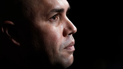 In this Dec. 10, 2019, file photo, New York Mets manager Carlos Beltran listens to a question during the Major League Baseball winter meetings in San Diego. Beltran is out as manager of the Mets. The team announced the move Thursday, Jan. 16, 2020.