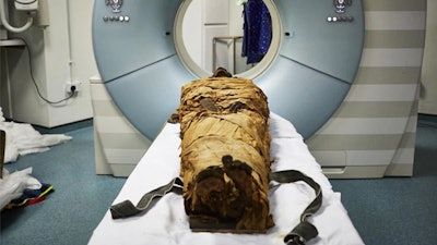The mummified body of Nesyamun laid on the couch to be CT scanned at Leeds General Infirmary.