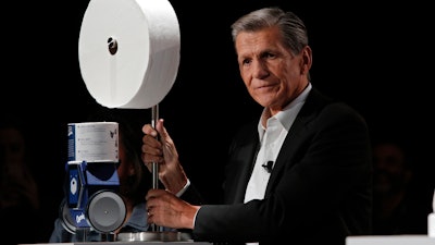 Procter & Gamble Chief Brand Officer Marc Pritchard shows off the Charmin Forever Roll and the Charmin RollBot during a Procter & Gamble news conference before CES International, Sunday, Jan. 5, 2020, in Las Vegas.