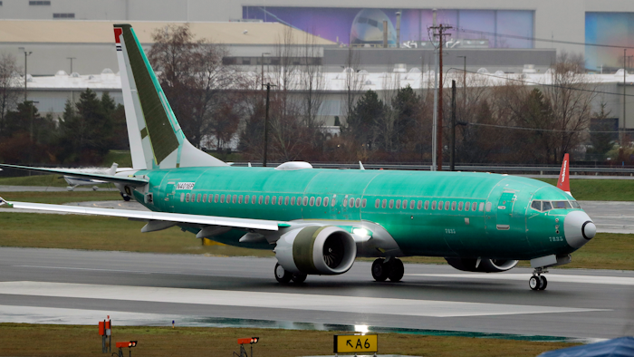 In this Dec. 11, 2019, file photo, a Boeing 737 Max being built for Norwegian Air International taxis for a test flight, at Renton Municipal Airport in Renton, Wash. Boeing has found a new problem with changes it is making to software on the 737 Max, but the company says the issue will not further delay the grounded plane’s return to flight. The head of the Federal Aviation Administration, Stephen Dickson, discussed the issue Thursday, Feb. 6, 2020 with reporters in London.