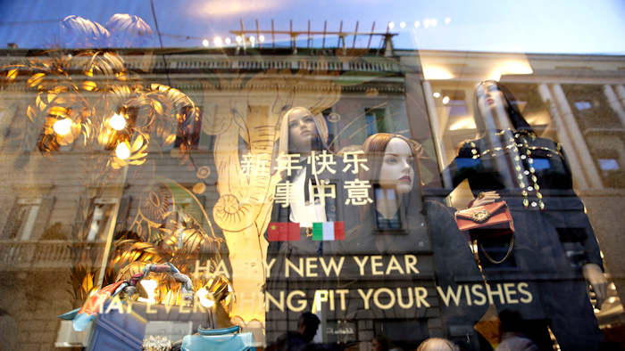 Dummies are displayed in a fashion shop at the Montenapoleone shopping district, in Milan, Italy, Tuesday, Feb. 4, 2020.