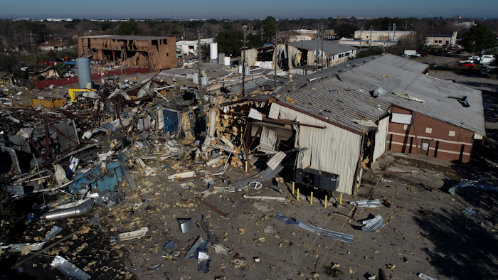 This Jan. 24, 2020, file aerial photo shows the scene of an explosion that rocked northwest Houston. A company filed for bankruptcy Thursday, Feb. 6, 2020, in the wake of a massive explosion at one of its warehouses in Houston that killed two workers, injured 20 more and damaged hundreds of buildings. Watson Grinding and Manufacturing said it filed for Chapter 11 bankruptcy in Houston federal court because of what it expects to be “a long-term interruption of business operations” due to the Jan. 24 blast.