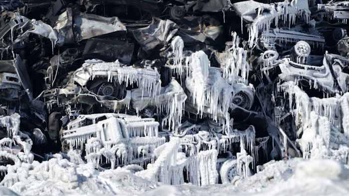 The massive fire at Northern Metal recycling in Becker, Minnesota, that has been burning for days, seemed to be under control Thursday, Feb. 20, 2020 with massive piles of burned cars covered in ice. The Becker Police Department posted Thursday that “major progress' has been made and that fire crews report the fire is “under control at this point.”