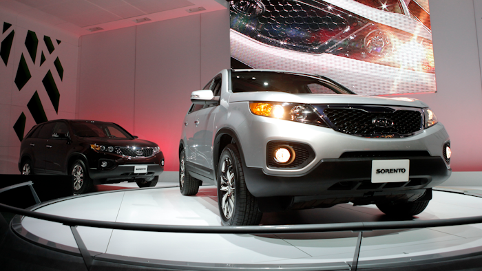 In this Dec. 2, 2009, file photo, the 2011 Kia Sorento debuts at the Los Angeles Auto Show in Los Angeles. Kia is joining its affiliate Hyundai in recalling thousands of vehicles in the U.S. because water can get into a brake computer, cause an electrical short and possibly a fire. The Kia recall covers nearly 229,000 Sedona minivans from the 2006 through 2010 model years. Also covered are Sorento SUVs from 2007 through 2009.