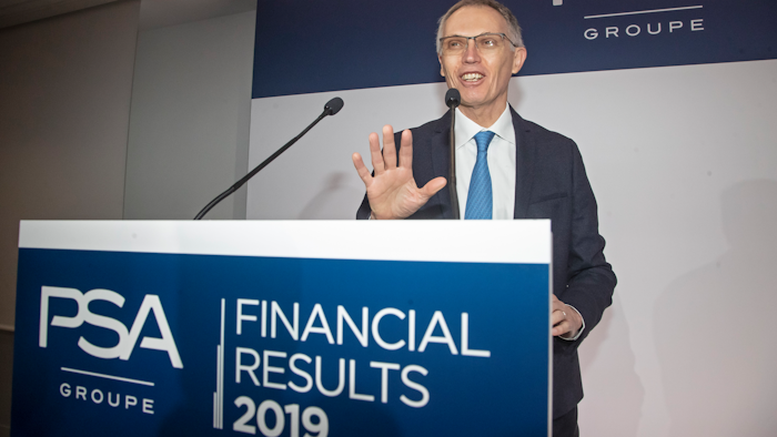 CEO of PSA Groupe Carlos Tavares arrives for the presentation of the company's 2019 full year results, in Rueil-Malmaison, west of Paris, Wednesday, Feb. 26, 2020. The French carmaker announced a new profitability record in 2019.