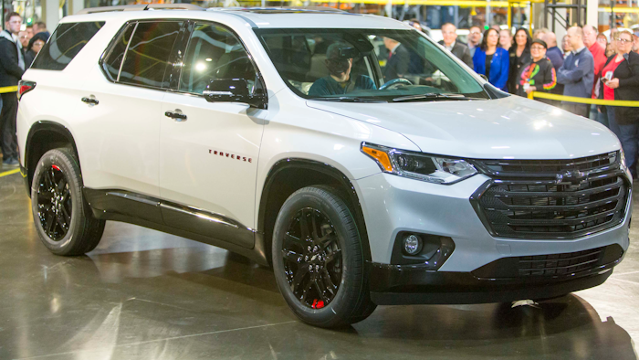 Darrell Kransz, a GM employee for 43.7 years, who also drove the 1 and 2 millionth vehicles produced, positions for a photo in a 2020 Chevrolet Traverse Premier Redline Edition after it rolled off the production line.