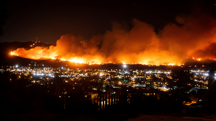 In this Oct. 31, 2019, file photo, smoke from the Maria Fire billows above Santa Paula, Calif.