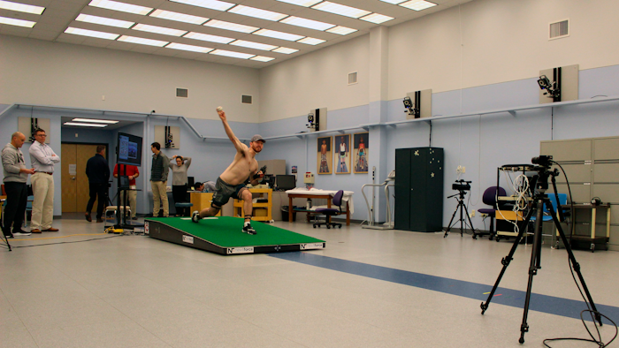 Central Connecticut pitcher Michael DeLease throws off a smart mound at the Center for Motion Analysis in Farmington, Connecticut.