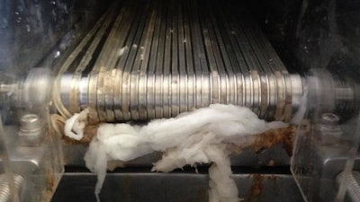 This conveyer of rubber bands separates solid and liquid waste effectively in an experimental sanitation system at a test site in India. But at a facility in South Africa, where the culture uses toilet paper, the results aren't as good. This was one of many lessons learned from two eight-month-long field trials for sanitation systems sponsored by the Bill and Melinda Gates Foundation.