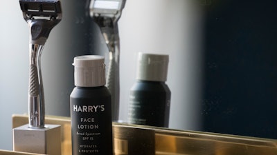 In this June 15, 2018, file photo, the Winston razor and Harry's face lotion are on display at the headquarters of Harry's Inc., in New York. Federal antitrust regulators say a proposed merger that would combine old-school shaving company Schick with upstart Harry's would end up costing consumers some skin.