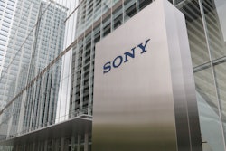 In this July 19, 2019, file, photo, people walk out from the headquarters of Sony Corp., in Tokyo.