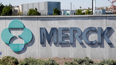 This May 1, 2018, file photo shows Merck corporate headquarters in Kenilworth, N.J. Merck is posting a 29% jump in fourth-quarter profit and it's spinning off its women's health division and other operations that churn out $6.5 billion in annual revenues. The drugmaker on Wednesday, Feb. 5, 2020 reported net income of $2.36 billion, up from $1.83 billion, a year earlier.