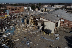 This Jan. 24, 2020, file aerial photo shows the scene of an explosion that rocked northwest Houston. A company filed for bankruptcy Thursday, Feb. 6, 2020, in the wake of a massive explosion at one of its warehouses in Houston that killed two workers, injured 20 more and damaged hundreds of buildings. Watson Grinding and Manufacturing said it filed for Chapter 11 bankruptcy in Houston federal court because of what it expects to be “a long-term interruption of business operations” due to the Jan. 24 blast.