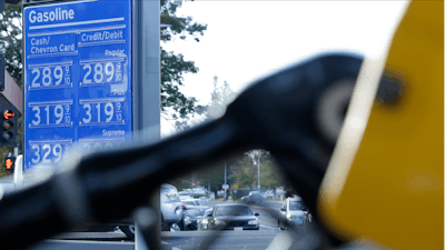 In this Oct. 30, 2017, file photo, gasoline prices are displayed at a Chevron station in Sacramento, Calif.