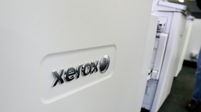 This May 24, 2016, file photo shows Xerox copiers at a store, in North Andover, Mass.