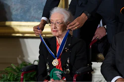In this Nov. 24, 2015 photo, Willie Mays, right, looks on as President Barack Obama presents the Presidential Medal of Freedom to NASA mathematician Katherine Johnson during a ceremony in the East Room of the White House, in Washington. Johnson, a mathematician on early space missions who was portrayed in film 'Hidden Figures,' about pioneering black female aerospace workers, died Monday, Feb. 24, 2020.