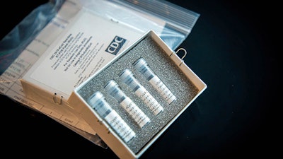 This undated photo provided by U.S. Centers for Disease Control and Prevention shows CDC’s laboratory test kit for the new coronavirus.