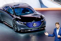 In this file photo Ola Kaellenius, CEO of Mercedes, stands next to a 'Vision EQS' car at the IAA Auto Show in Frankfurt, Germany.