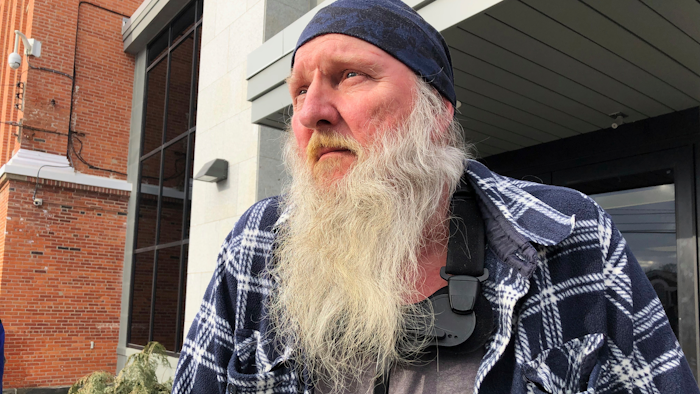 This Feb. 4, 2018, file photo shows Ray Kemble speaking with reporters outside the Susquehanna County Courthouse in Montrose, Pa. Houston-based Cabot Oil Gas Corp pulled out of settlement talks aimed at resolving its $5 million lawsuit against Kemble whose drinking water was contaminated and who has spent years bashing the energy industry. Cabot says it pulled out of a settlement conference scheduled for Friday, March 6, 2020, because there has been no progress in talks.
