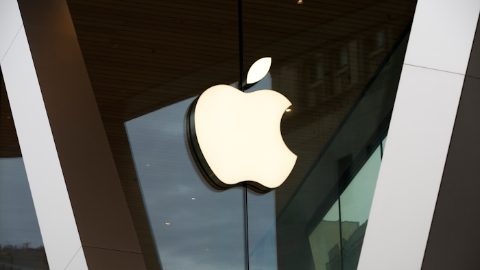 An Apple logo adorns the facade of the downtown Brooklyn Apple store in New York on Saturday, March 14, 2020. Apple has said it would close most of its retail stores outside mainland China, Hong Kong and Taiwan for two weeks.