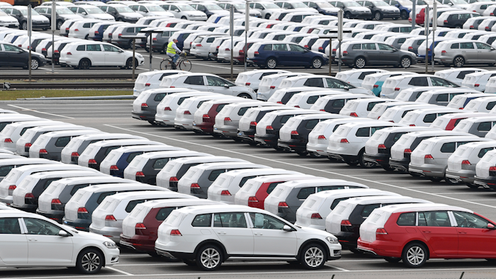 New Volkswagen vehicles are storage in a car park at the Volkswagen plant in Zwickau, Germany, Monday, March 17, 2020.German automaker Volkswagen says it is shutting down most of its European plants for two weeks due to the coronavirus outbreak. For most people, the new coronavirus causes only mild or moderate symptoms, such as fever and cough. For some, especially older adults and people with existing health problems, it can cause more severe illness, including pneumonia.