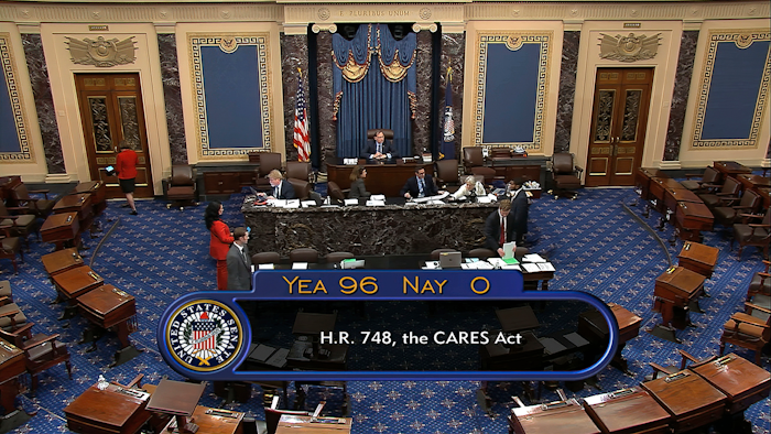 In this image from video, the final vote of 96-0 shows passage of the $2.2 trillion economic rescue package in response to coronavirus pandemic, passed by the Senate at the U.S. Capitol in Washington, Wednesday, March 25, 2020.