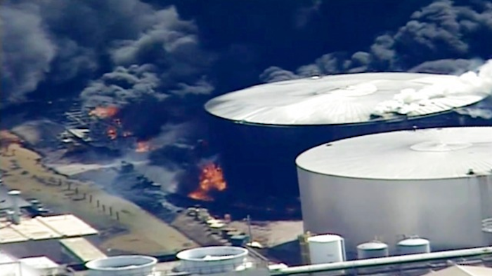 This aerial image from video provided by KSTP-TV in Minneapolis, shows smoke rising from the Husky Energy oil refinery after an explosion Thursday, April 26, 2018, at the plant in Superior, Wis.