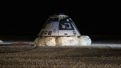 This Sunday, Dec. 22, 2019 file photo shows the Boeing Starliner spacecraft after it landed in White Sands, N.M. On Friday, Feb. 28, 2020, Boeing acknowledged it failed to conduct full and adequate software tests before the botched space debut of its astronaut capsule late last year.