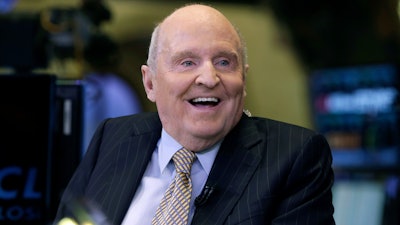 In this Oct. 22, 2013 file photo, former Chairman and CEO of General Electric Jack Welch appears on CNBC on the floor of the New York Stock Exchange. Welch, who transformed General Electric Co. into a highly profitable multinational conglomerate and parlayed his legendary business acumen into a retirement career as a corporate leadership guru, has died at the age of 84.