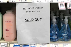 A sign on a shelf at a QFC grocery store in Kirkland, Wash., advises shoppers, Tuesday, March 3, 2020, that all hand sanitizer products are sold out.