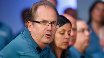In this July 16, 2019, file photo, Gary Jones, United Auto Workers President, speaks during the opening of their contract talks with Fiat Chrysler Automobiles in Auburn Hills, Mich. Federal prosecutors have charged the former president of the United Auto Workers with corruption, Thursday, March 5, 2020, alleging he conspired with others at the union to embezzle more than $1 million. Jones quit his post in November 2019.