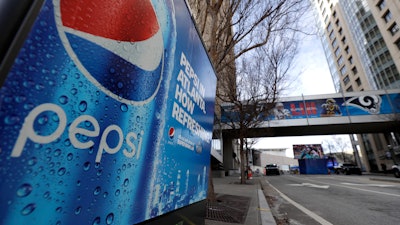 In this Jan. 30, 2019, file photo, an advertisement for Pepsi is shown downtown for the NFL Super Bowl 53 football game in Atlanta.