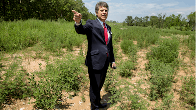 In this July 25, 2018, file photo, Stephen Bell, president and CEO of the Arkadelphia Area Chamber of Commerce, talks about what he hopes will be a new paper mill in Arkadelphia, Ark. A Chinese company has abandoned its plan to build a massive paper mill in southwestern Arkansas that had already been delayed by trade tensions.