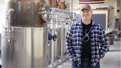 Chad Butters, founder of Eight Oaks Farm Distillery, poses for a photo at their facility in New Tripoli, Pa., Monday, March 16, 2020. Butters, who grew increasingly angry as he saw the skyrocketing price of hand sanitizer, has decided to do something about it: He's temporarily converting his operation into a production line for the suddenly hard-to-find, gooey, alcohol-based disinfectant.