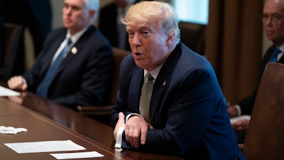 President Donald Trump speaks during a meeting with tourism industry executives about the coronavirus, in the Cabinet Room of the White House, Tuesday, March 17, 2020, in Washington.