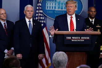 President Donald Trump speaks during press briefing with the coronavirus task force, at the White House, Thursday, March 19, 2020, in Washington. From left, Food and Drug Administration Commissioner Dr. Stephen Hahn, Vice President Mike Pence, Trump, and Surgeon General Jerome Adams.