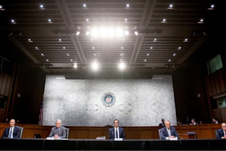From left, Labor Secretary Eugene Scalia, Senate Majority Leader Mitch McConnell of Ky., Treasury Secretary Steven Mnuchin, Senate Minority Leader Sen. Chuck Schumer of N.Y., and White House chief economic adviser Larry Kudlow attend a a meeting to discuss the coronavirus relief bill on Capitol Hill, Friday, March 20, 2020, in Washington.