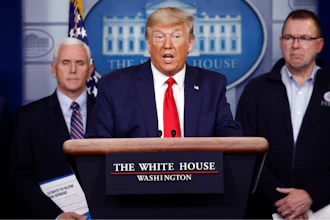 President Donald Trump speaks as Vice President Mike Pence, left, and FEMA Administrator Peter Gaynor look on during a coronavirus task force briefing at the White House, March 22, 2020.