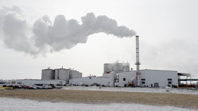 In this Jan. 6, 2015 file photo steam blows over the Green Plains ethanol plant in Shenandoah, Iowa. As hospitals and nursing homes run out of hand sanitizer to fight off the coronavirus, struggling ethanol producers are eager to help. They could provide alcohol to make millions of gallons of the germ-killing sanitizer, but the U.S. Food and Drug Administration has put up a roadblock, frustrating both the health care and ethanol industries with its inflexible regulations during a national health care crisis.