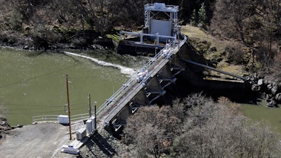 In this March 3, 2020, photo, a dam on the lower Klamath River known as Copco 2 is seen near Hornbrook, Calif.
