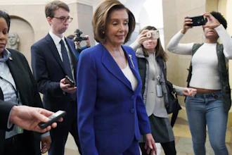 House Speaker Nancy Pelosi of Calif., arrives on Capitol Hill in Washington, Friday, March 27, 2020.