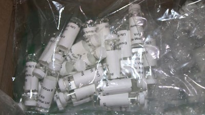 A package containing suspected counterfeit COVID-19 test kits, seized by U.S. Customs and Border Protection.
