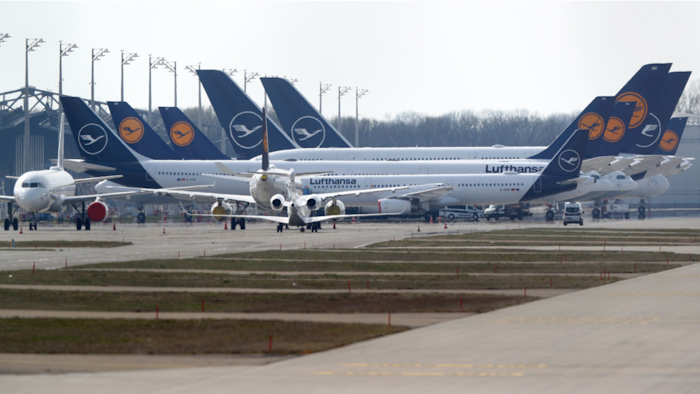 Lufthansa planes parked at the airport in Munich, March 26, 2020.